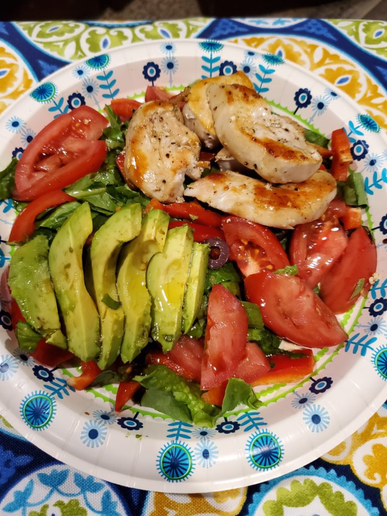grilled chicken with vegetables and avocado